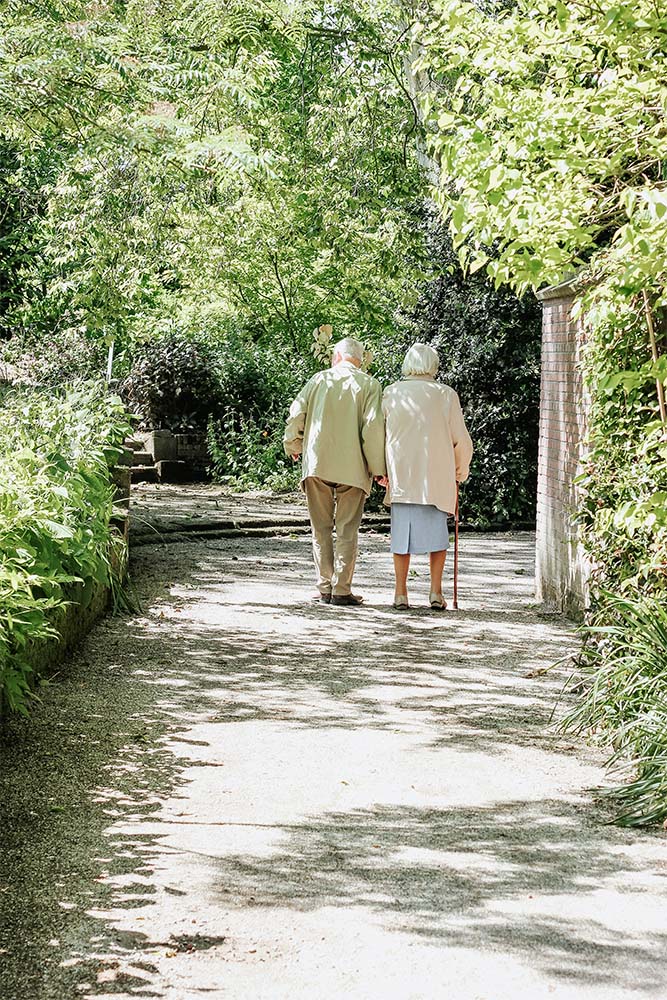 two residents walking together 