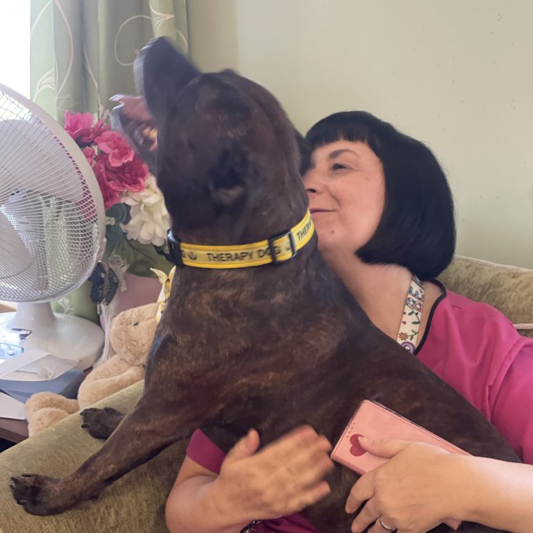 limewood staff with dog